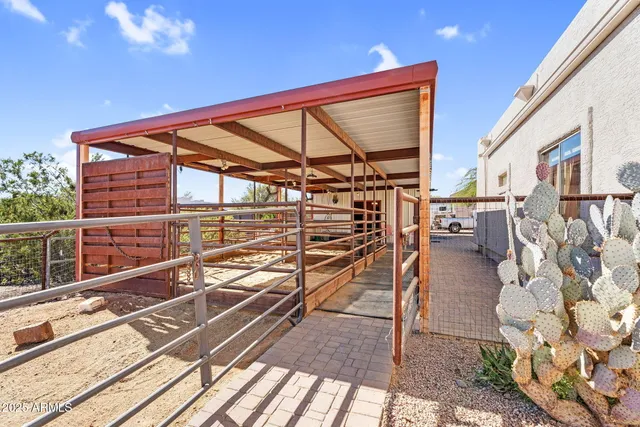 a view of a house with a snow on the road