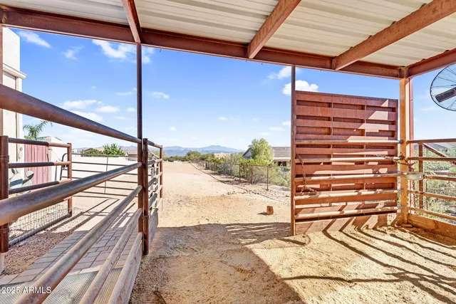 a view of a kitchen with a sink and cabinets