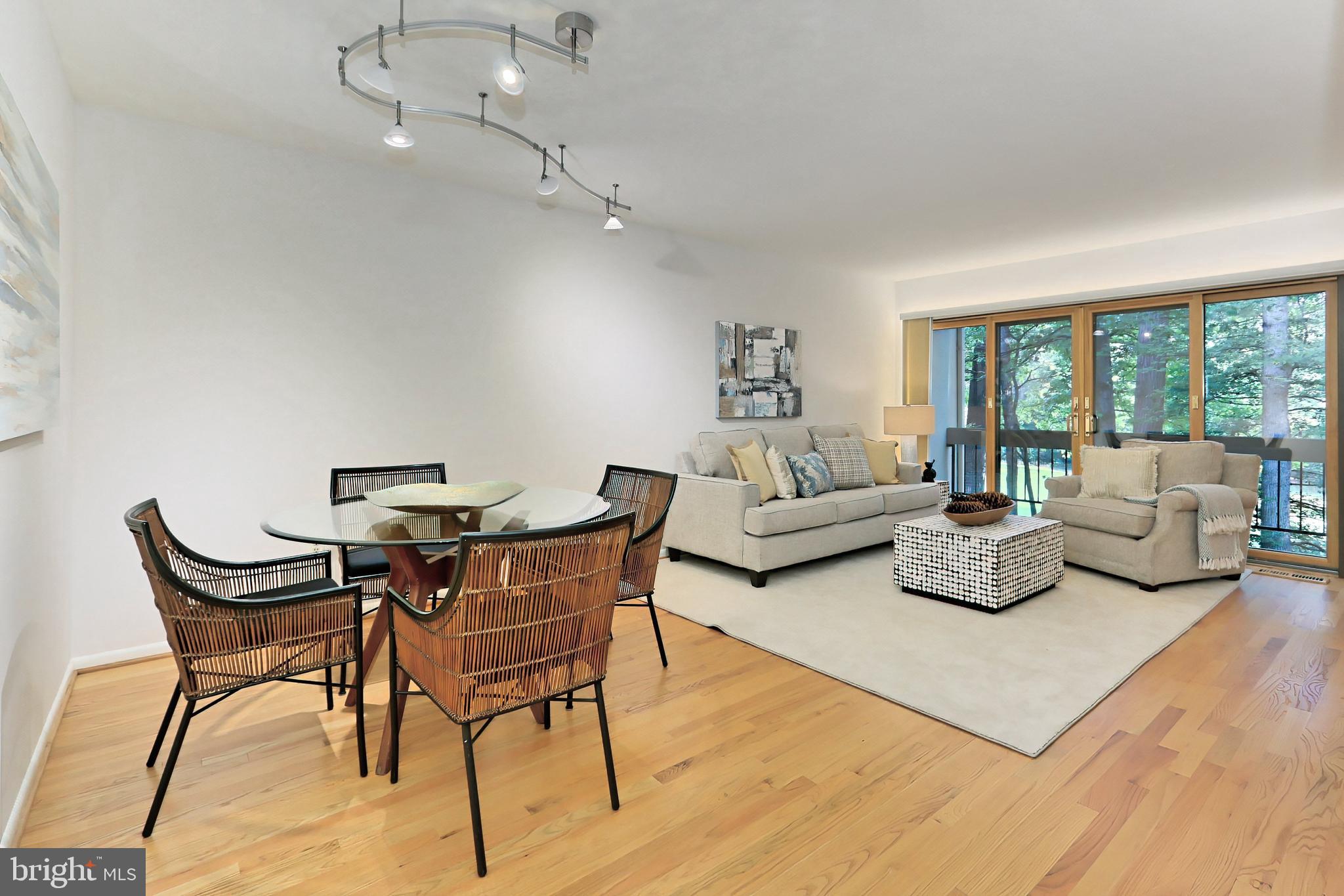 11704 Newbridge Court Reston, VA 20191 - Photo 11 of 64 Dining area with chic lighting