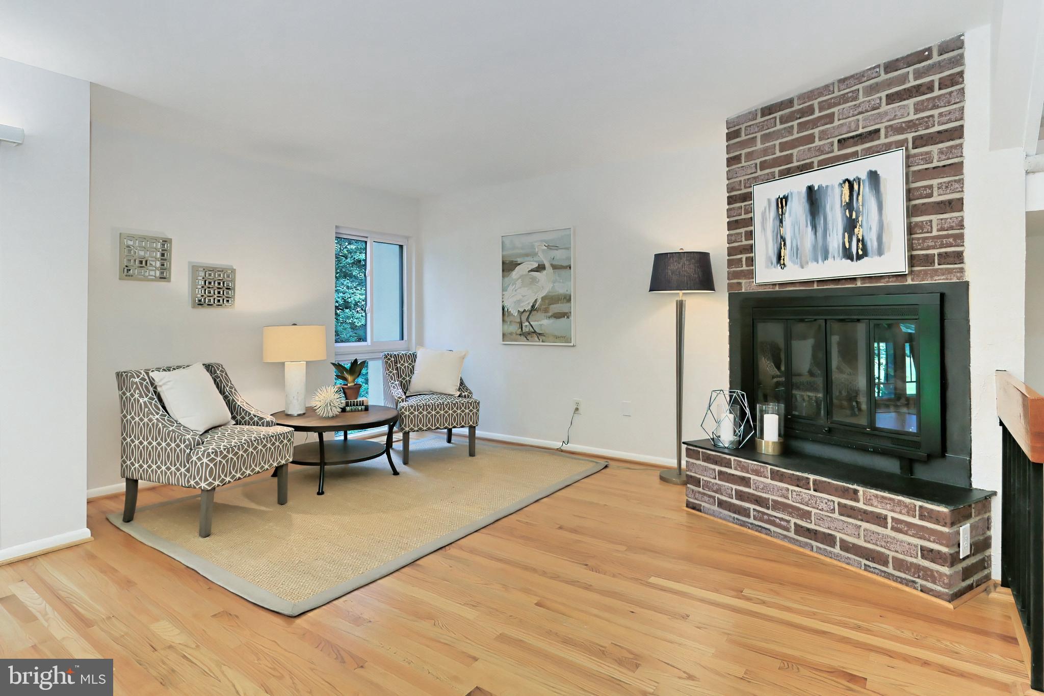 11704 Newbridge Court Reston, VA 20191 - Photo 13 of 64 Sitting area for relaxing by the fireplace