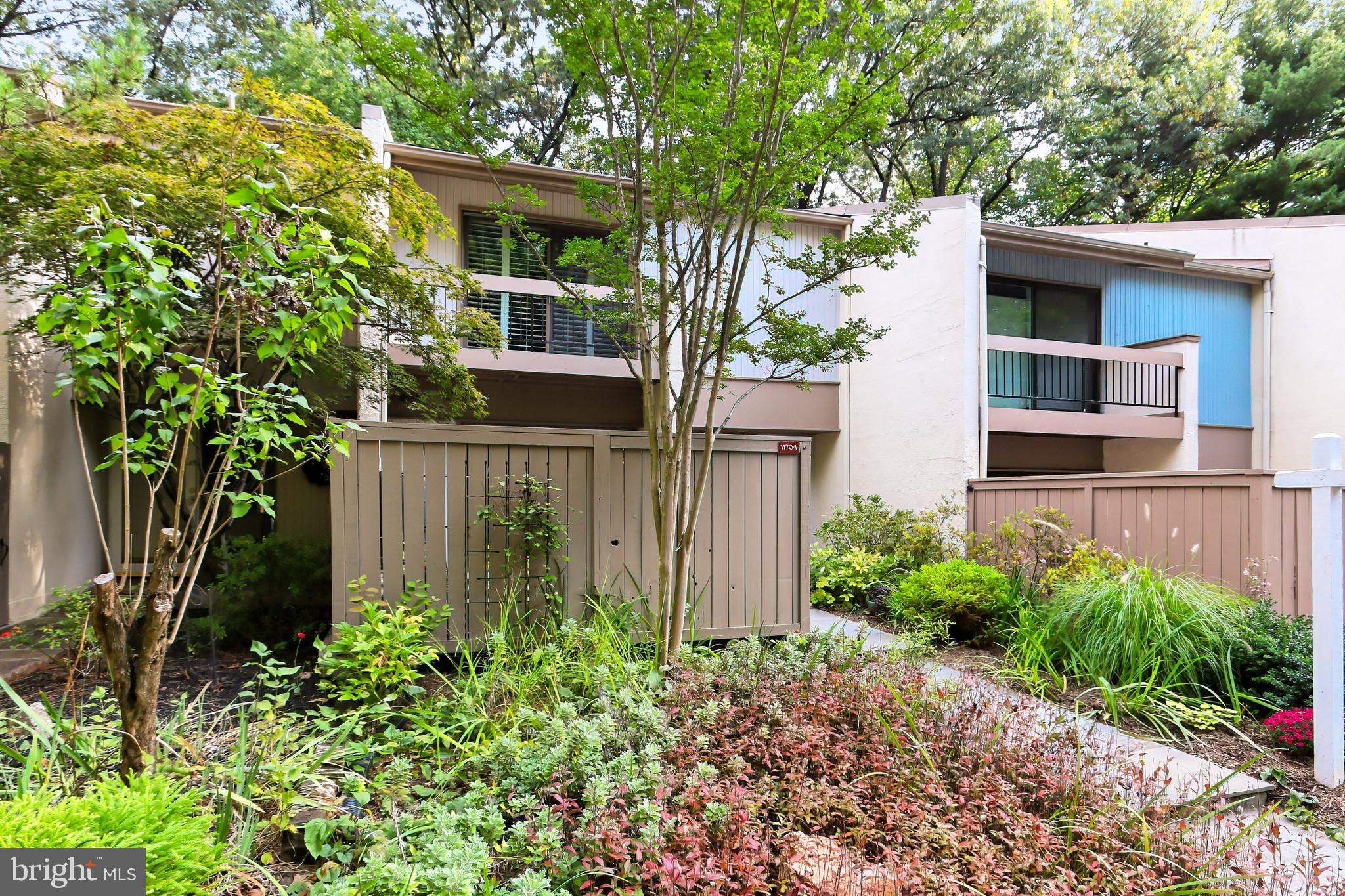 11704 Newbridge Court Reston, VA 20191 - Photo 2 of 64 Professionally landscaped with year-round blooms