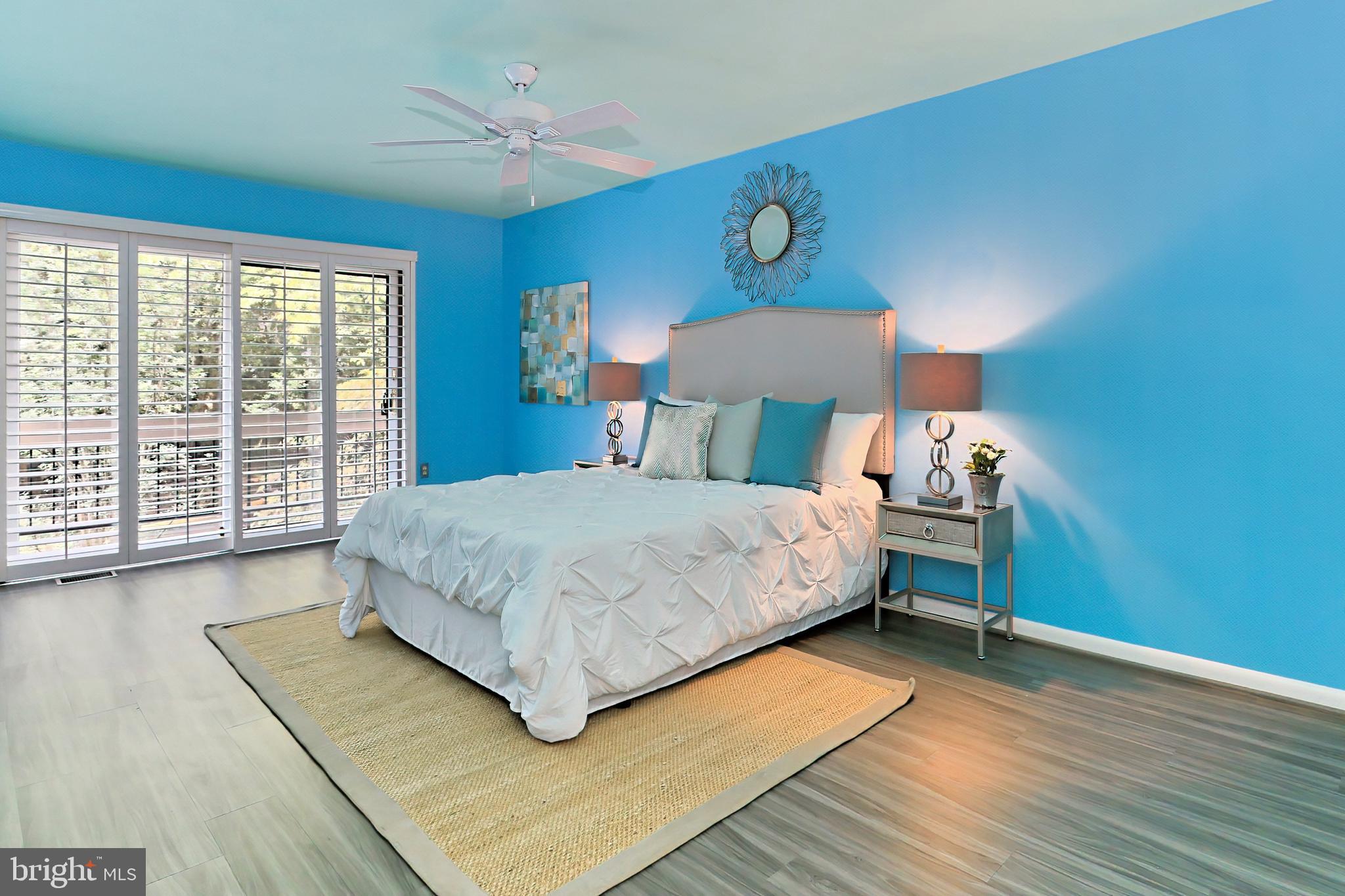 11704 Newbridge Court Reston, VA 20191 - Photo 23 of 64 Sliding plantation shutters cover Anderson doors