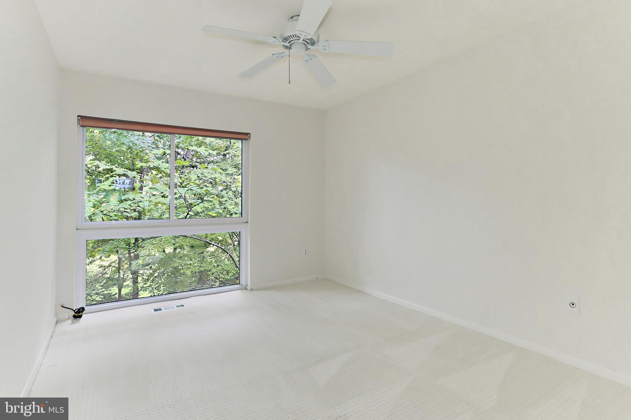 11704 Newbridge Court Reston, VA 20191 - Photo 30 of 64 Third Bedroom with ceiling fan & pristine carpet