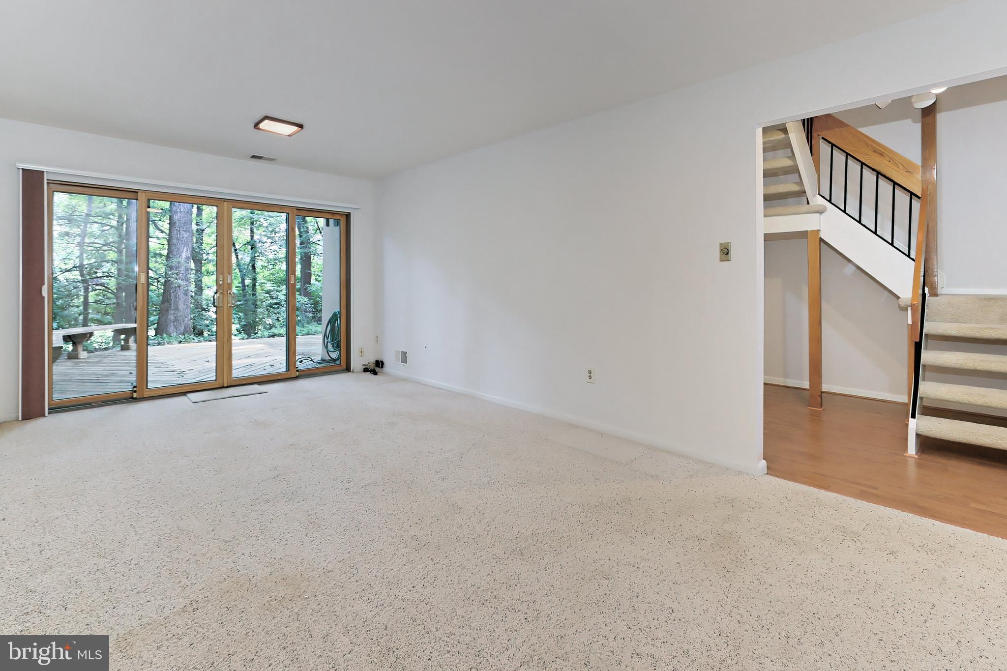 11704 Newbridge Court Reston, VA 20191 - Photo 32 of 64 Lower lvl Rec Room with Anderson doors to the deck