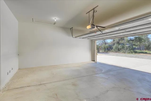 a view of entryway and workspace