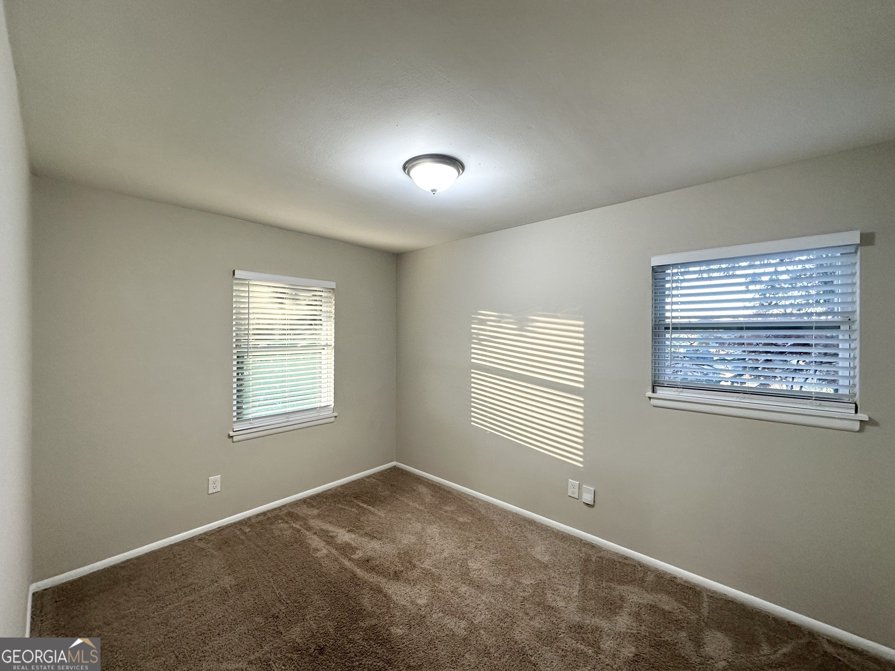 2852 Port Royal Lane Decatur, GA 30034 - Photo 15 of 18 a view of an empty room with a window