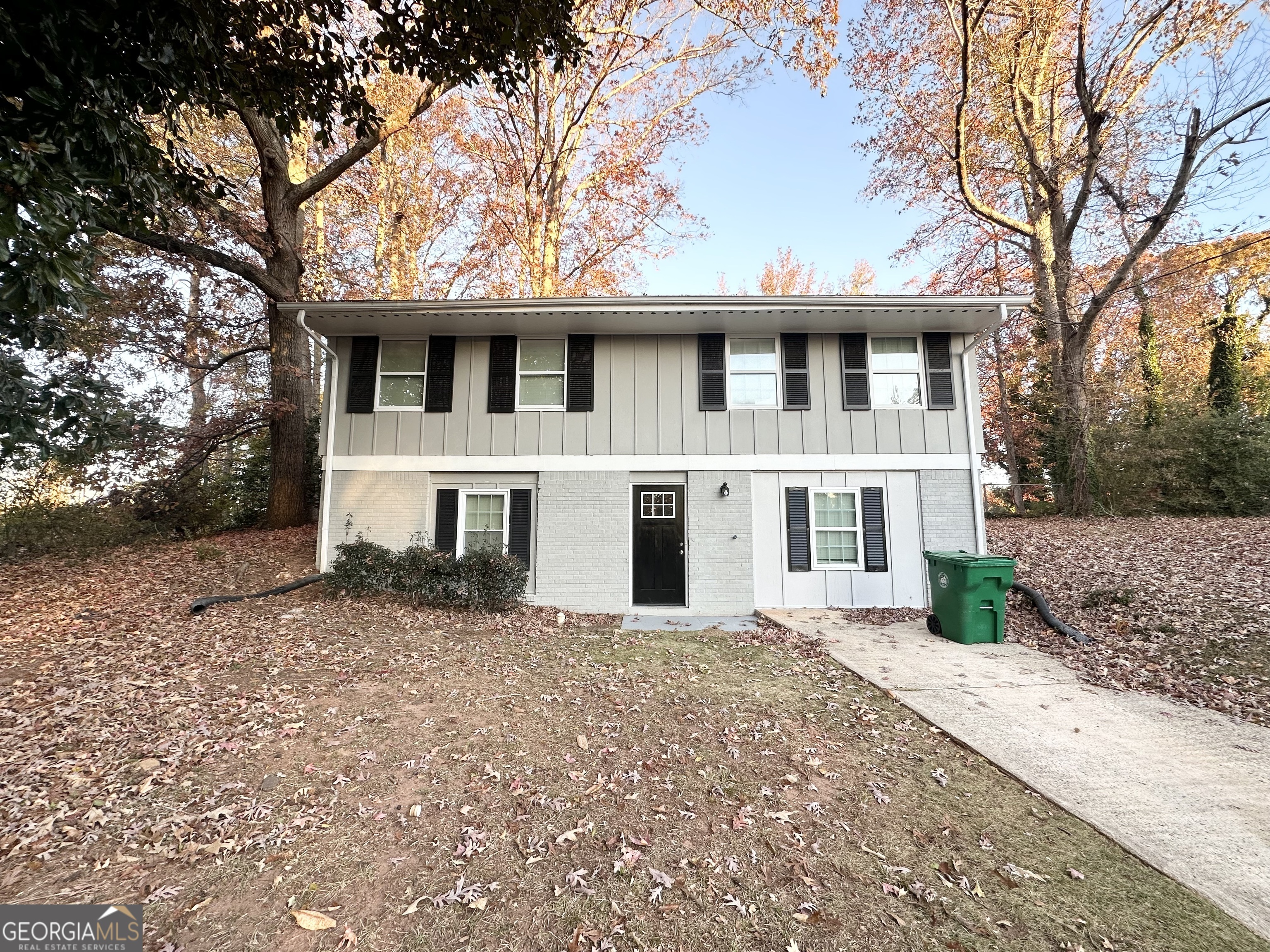 2852 Port Royal Lane Decatur, GA 30034 - Photo 2 of 18 a front view of a house with a garden