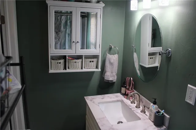 a view of a room that has a hardwood