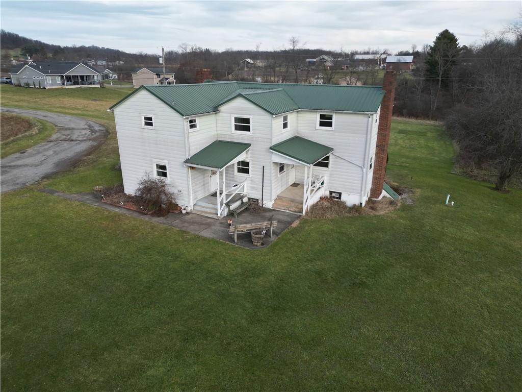 121 Powell Road Butler, PA 16002 - Photo 23 of 49 an aerial view of a house with a garden