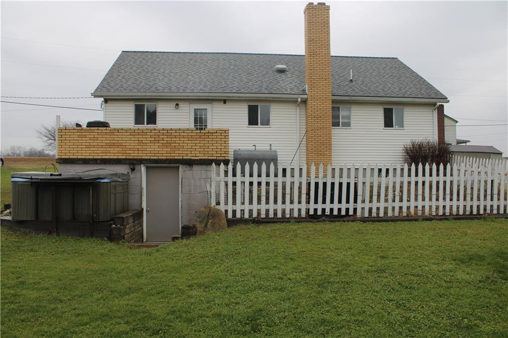 121 Powell Road Butler, PA 16002 - Photo 25 of 49 a front view of a house with a garden