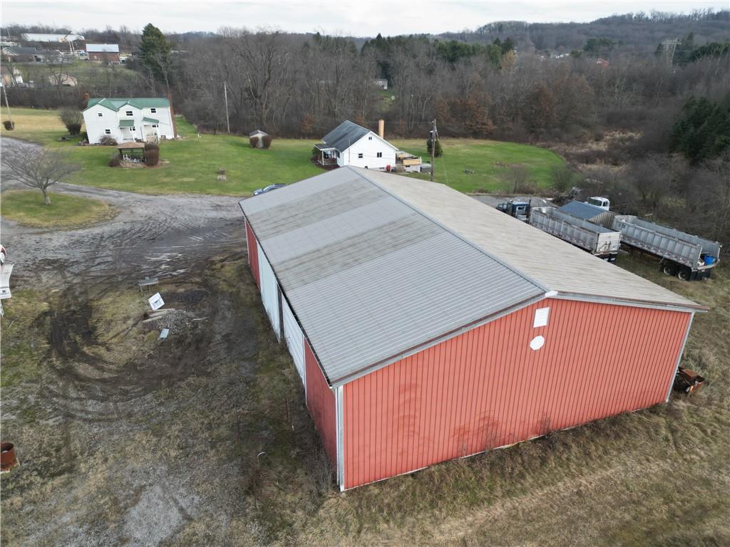 121 Powell Road Butler, PA 16002 - Photo 31 of 49 a backyard of a house with yard and trampoline