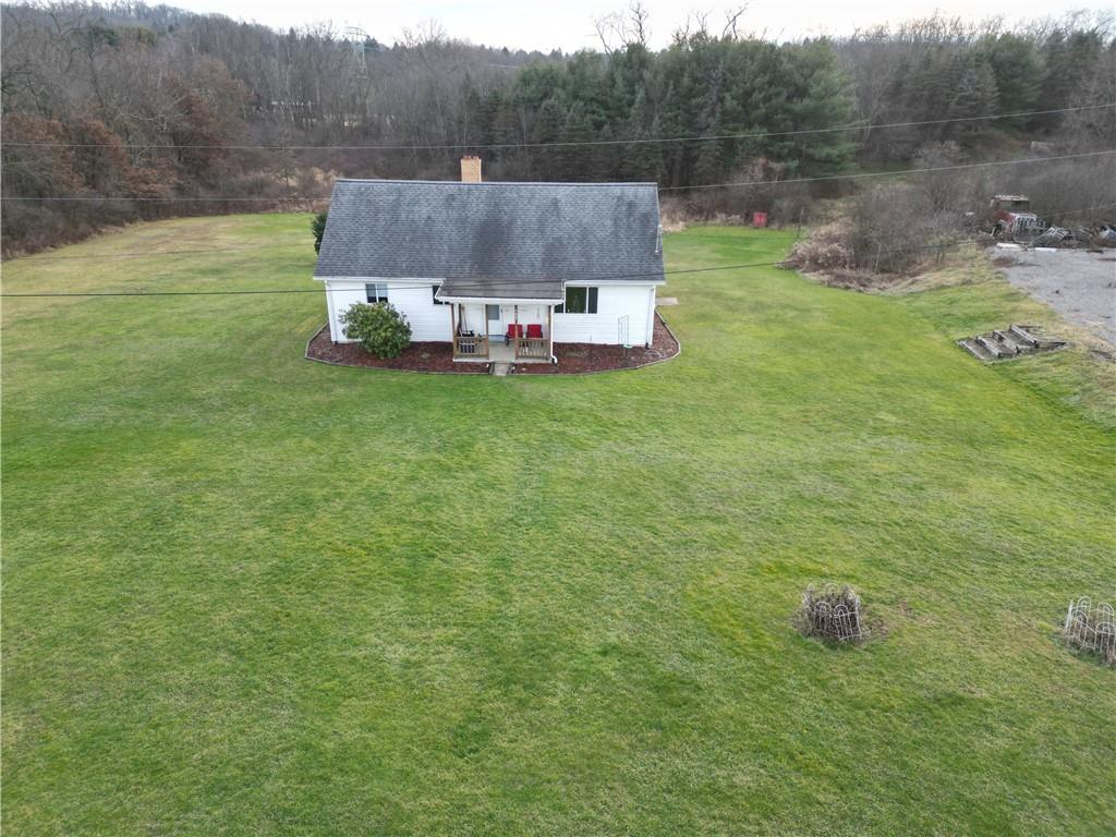 121 Powell Road Butler, PA 16002 - Photo 4 of 49 a view of a house with pool and a yard