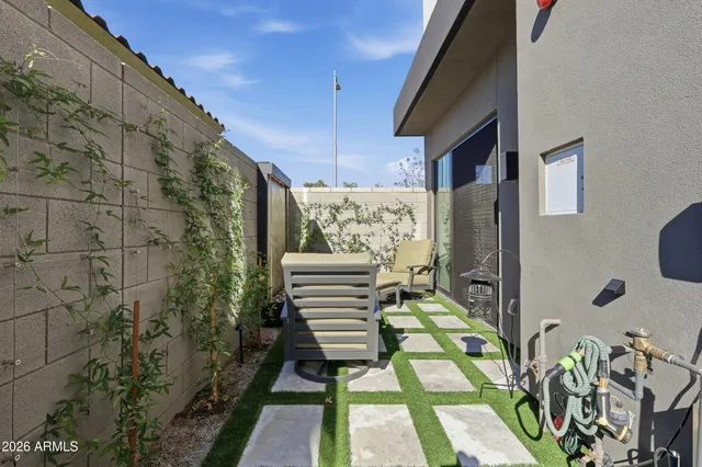 a balcony view with a garden space