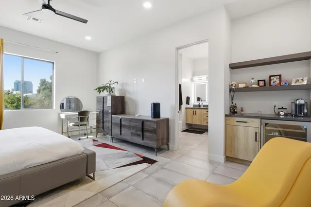 a bedroom with furniture and a couch