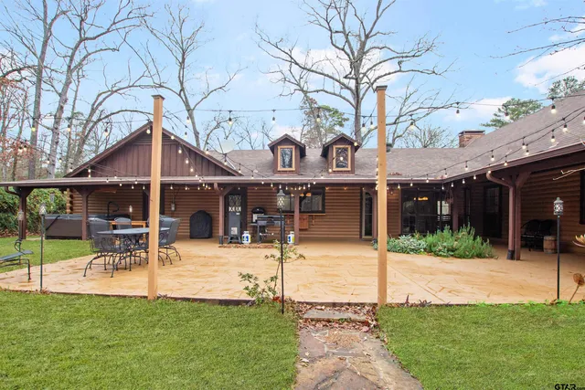 a view of a building with a yard