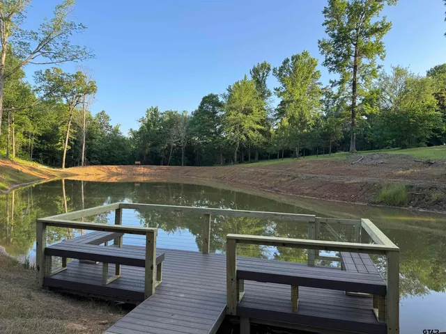 a view of open space with a garden