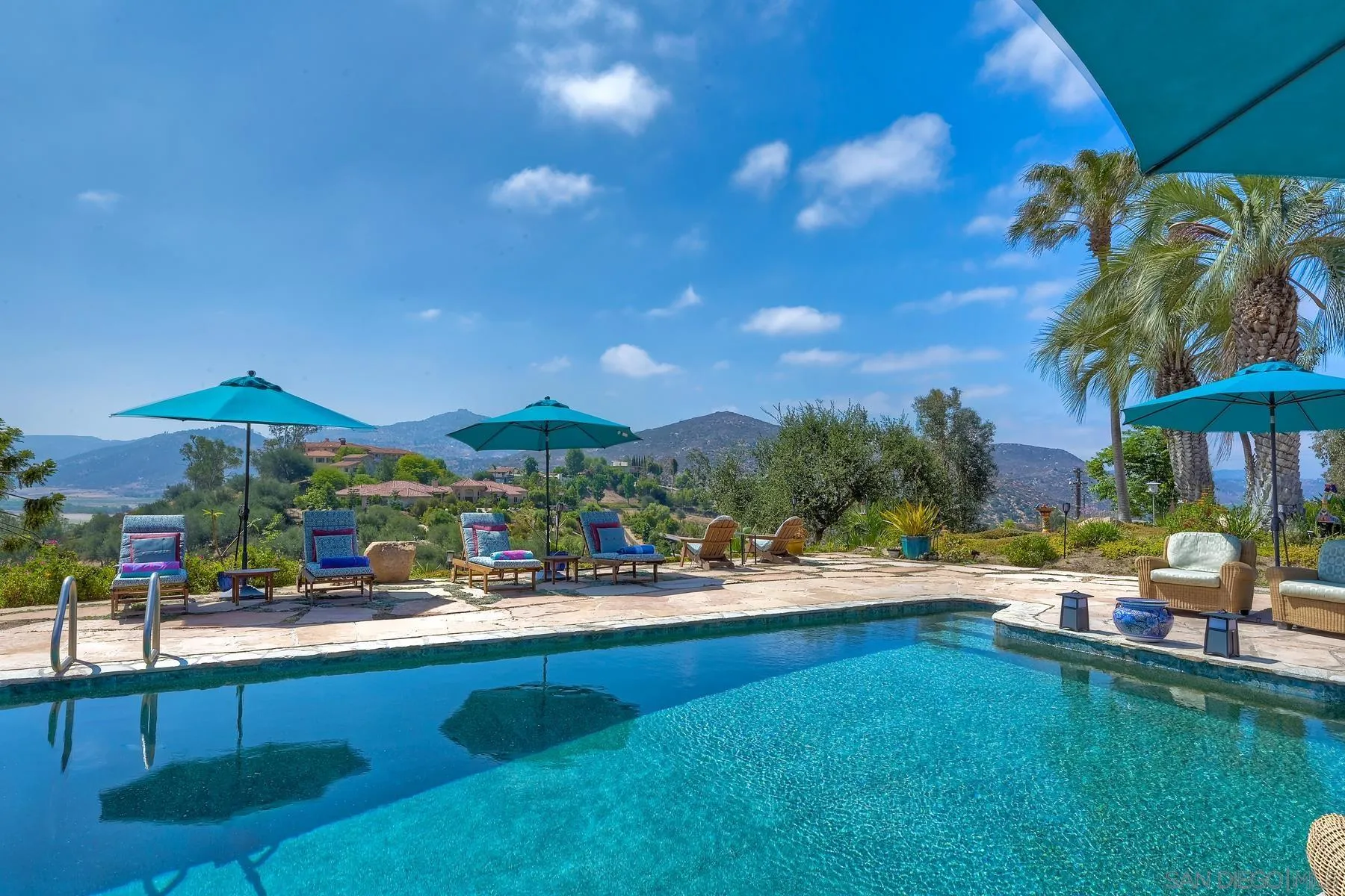 14102 Summit Crest Escondido, CA 92025 - Photo 11 of 52 a swimming pool view with a seating space