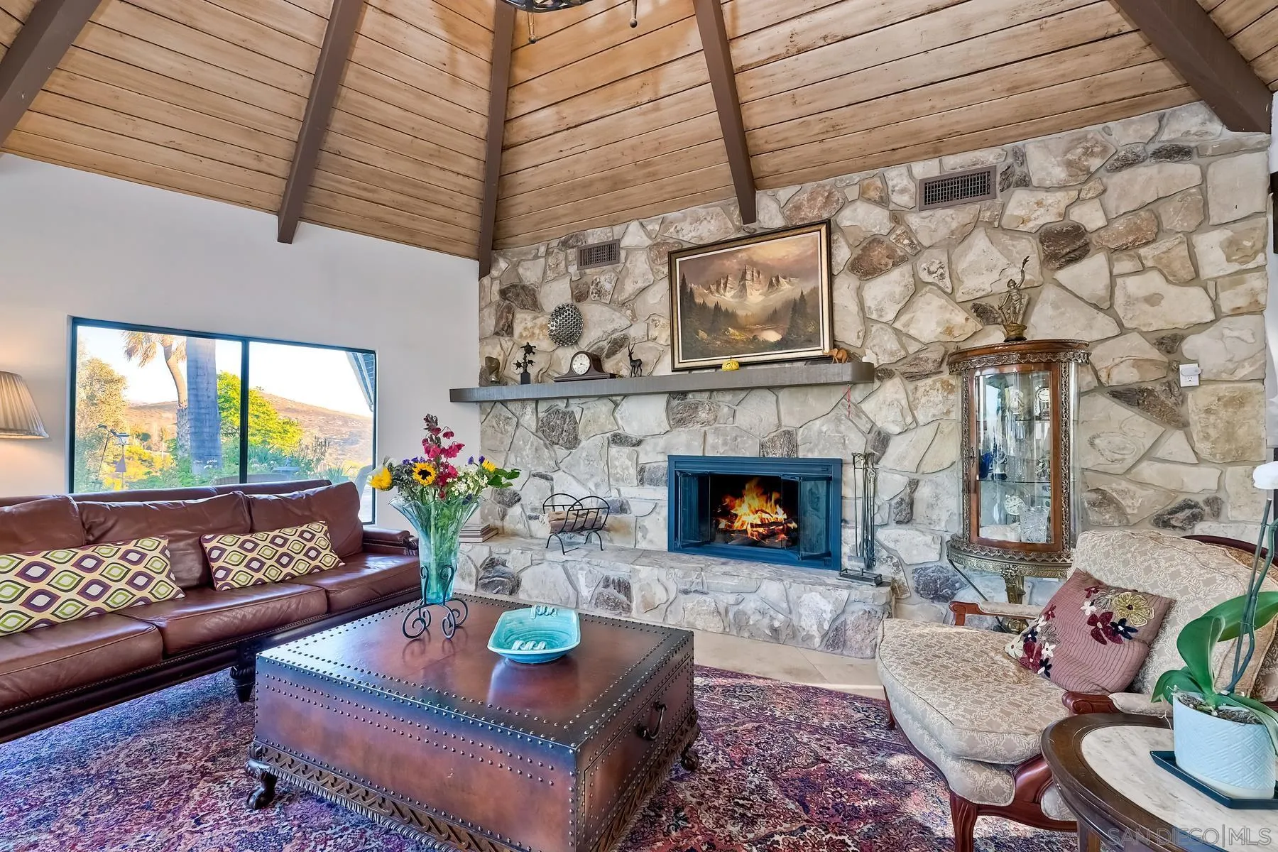 14102 Summit Crest Escondido, CA 92025 - Photo 16 of 52 a living room with furniture and a fireplace