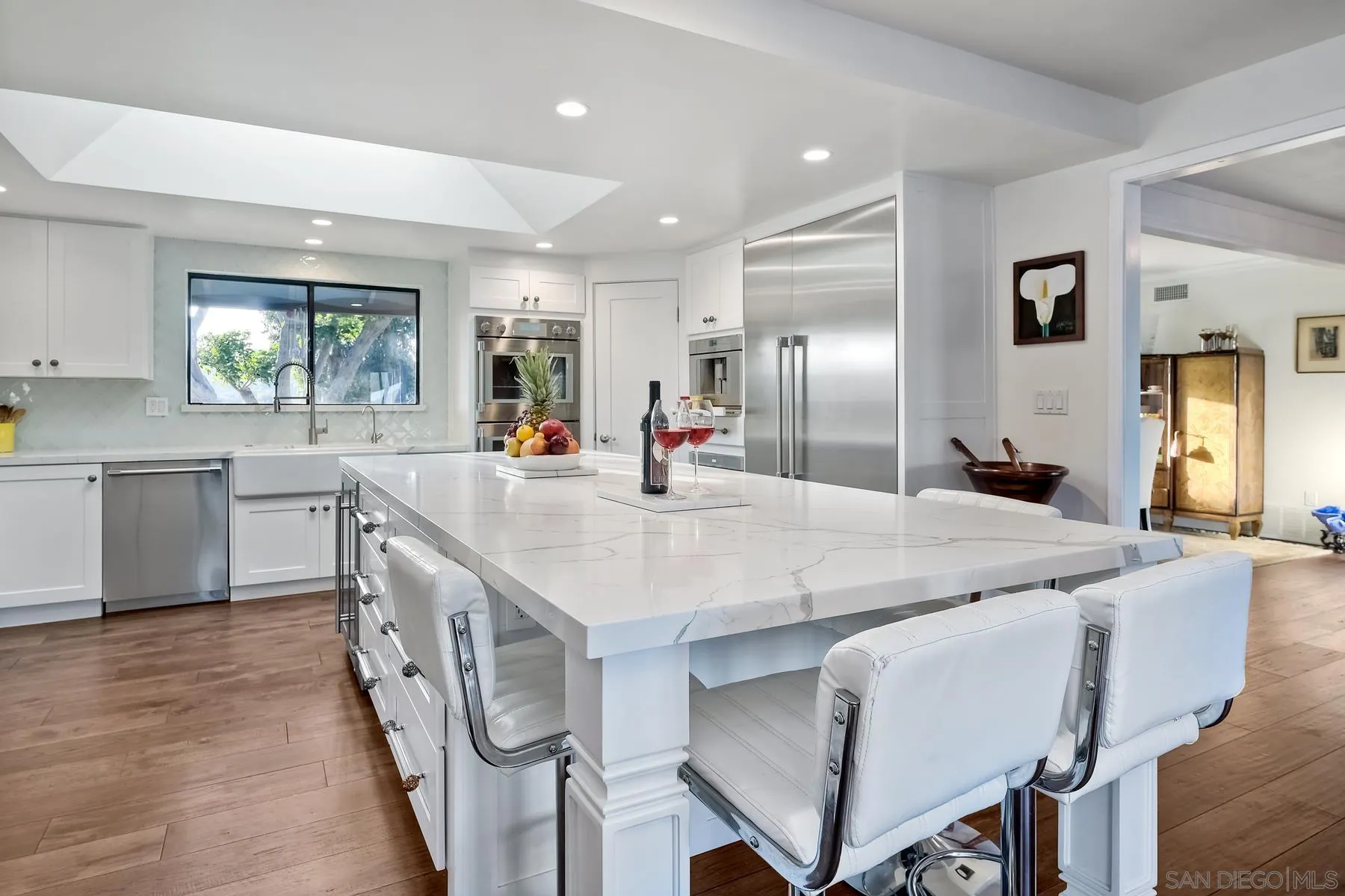 14102 Summit Crest Escondido, CA 92025 - Photo 18 of 52 a large kitchen with stainless steel appliances lots of counter space and breakfast area