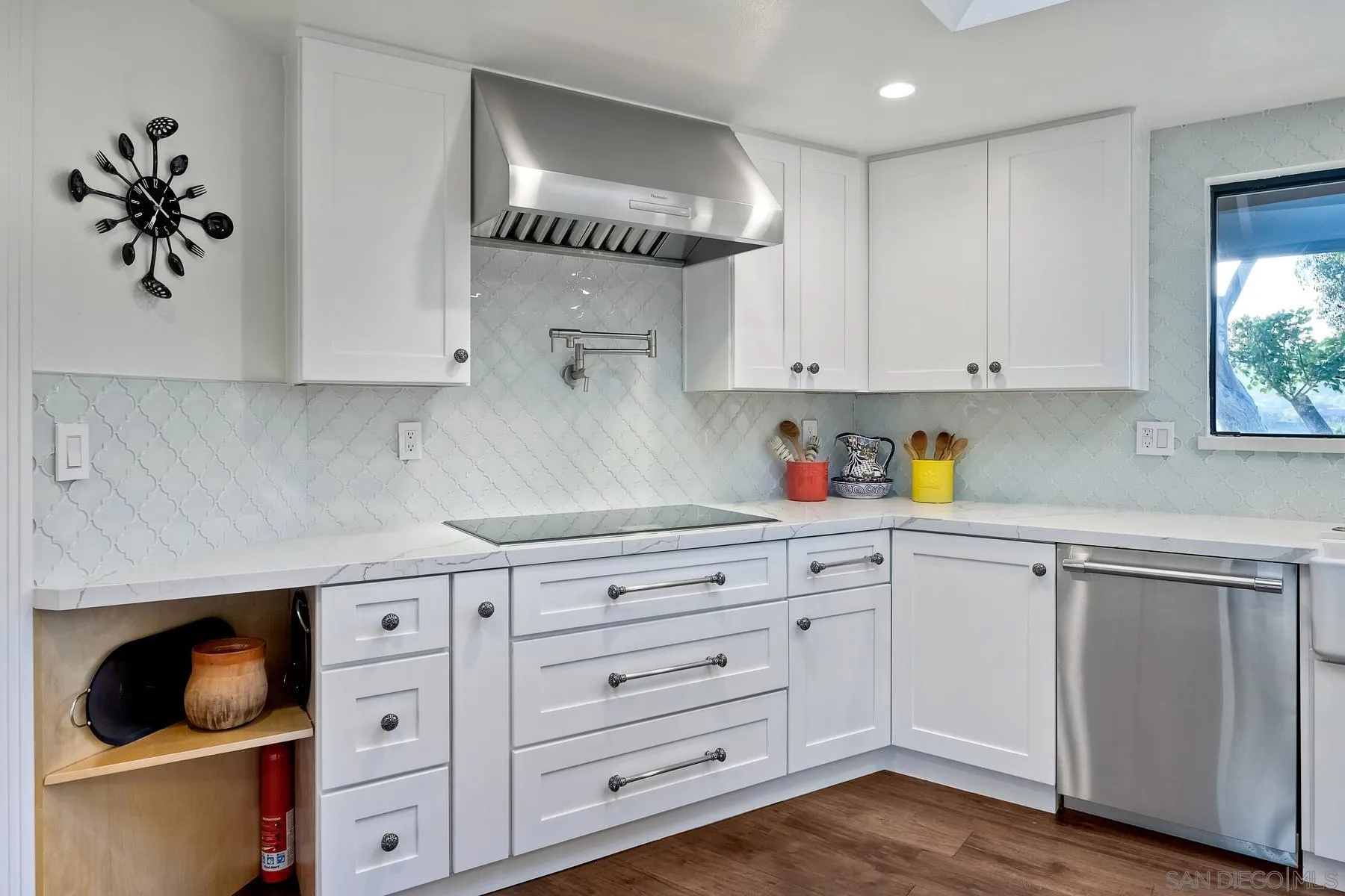 14102 Summit Crest Escondido, CA 92025 - Photo 21 of 52 a kitchen with cabinets and window