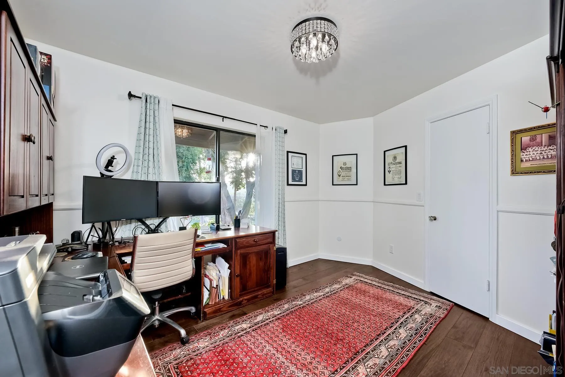 14102 Summit Crest Escondido, CA 92025 - Photo 27 of 52 a view of a workspace with furniture and a window
