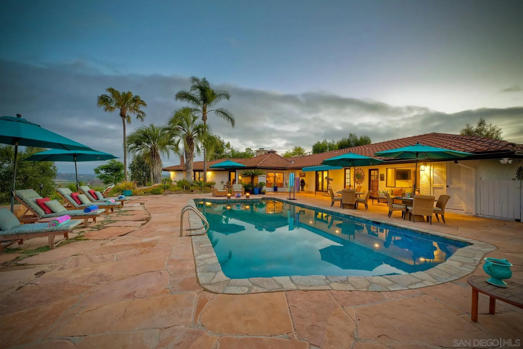 14102 Summit Crest Escondido, CA 92025 - Photo 41 of 52 a view of a swimming pool with an outdoor seating