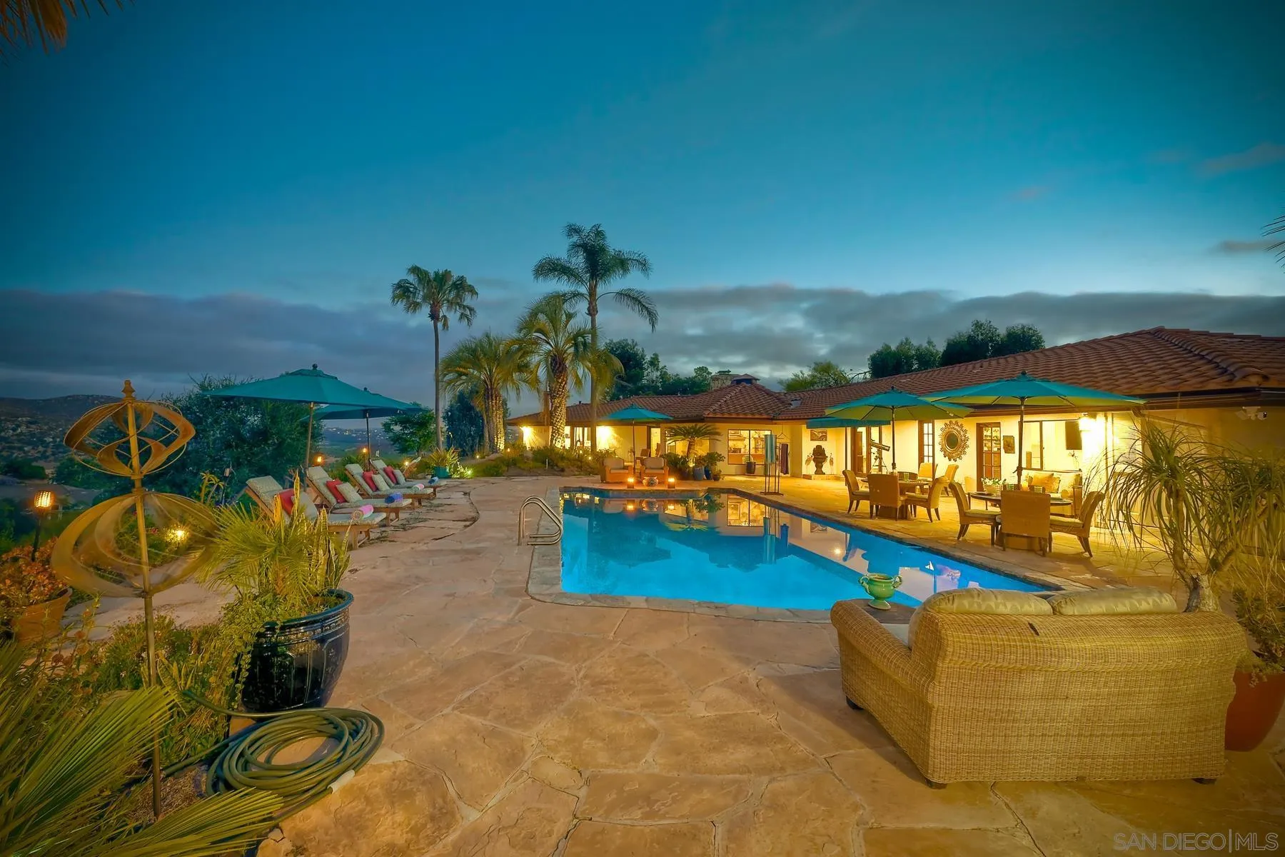14102 Summit Crest Escondido, CA 92025 - Photo 44 of 52 a view of a swimming pool with an outdoor seating