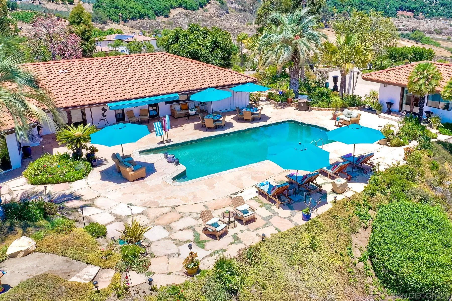 14102 Summit Crest Escondido, CA 92025 - Photo 46 of 52 a view of an house with garden space and sitting area