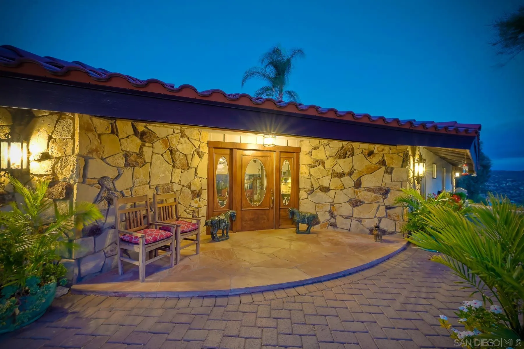 14102 Summit Crest Escondido, CA 92025 - Photo 6 of 52 a view of a patio with a table and chairs