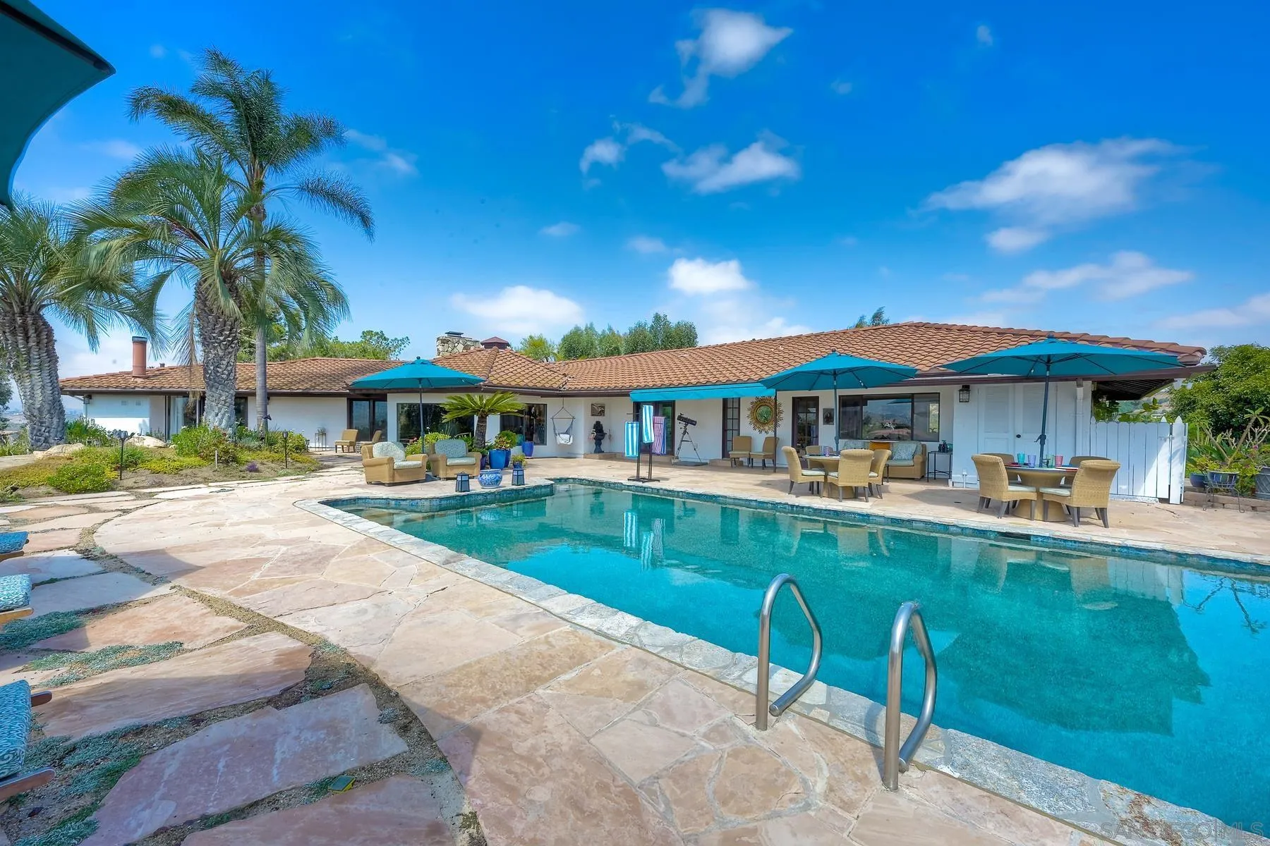 14102 Summit Crest Escondido, CA 92025 - Photo 9 of 52 a front view of house with yard and outdoor seating