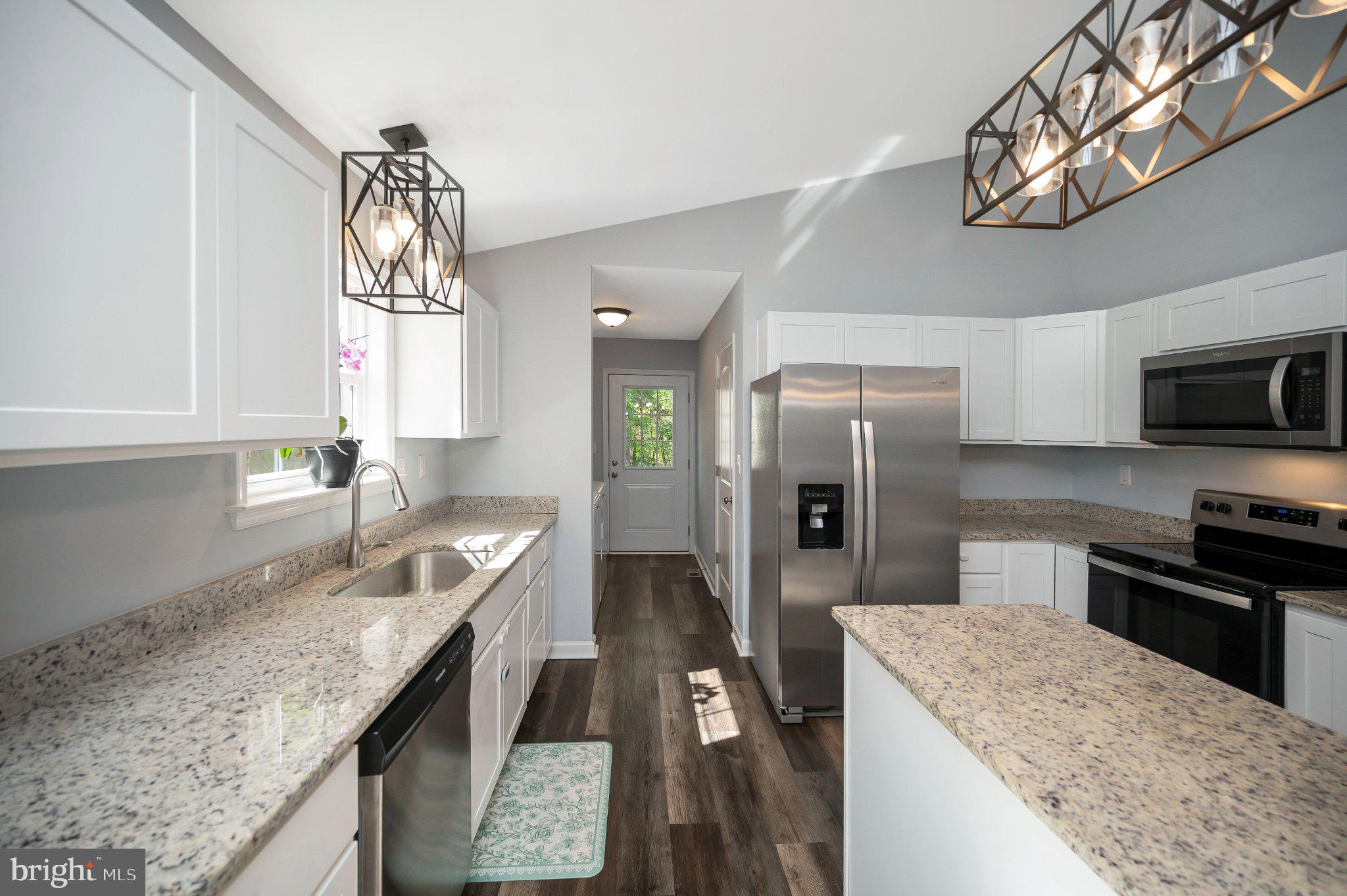28282 Tatum Road Unionville, VA 22567 - Photo 18 of 52 Modern kitchen with sleek finishes.