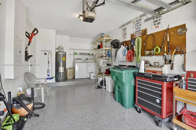 an aerial view of a house with a lake view