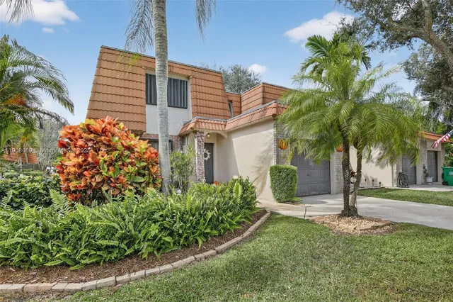 a view of a golf course with a lake