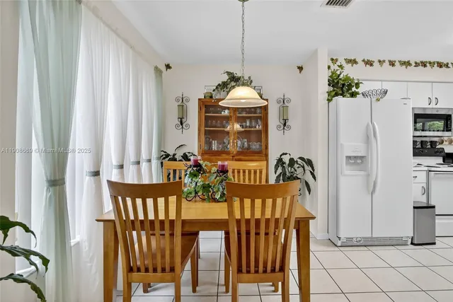 a front view of a house with wooden floor
