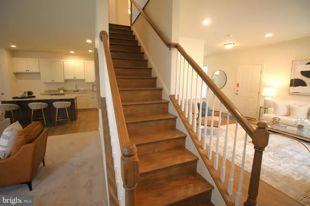 a bedroom with bed and a night stand