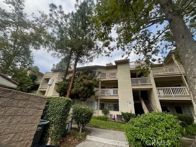 a front view of a house with swimming pool