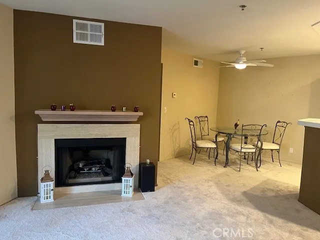 a view of backyard of house with green space