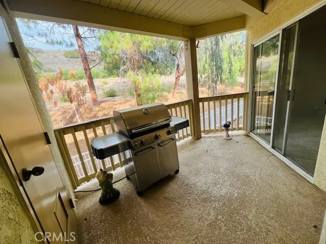 a bathroom with a granite countertop sink mirror and toilet