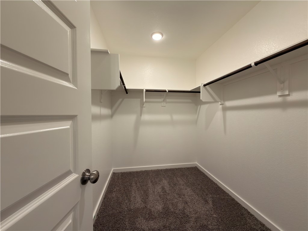 6053 Badger Street Bryan, TX 77807 - Photo 12 of 13 a view of a room with racks on the wall