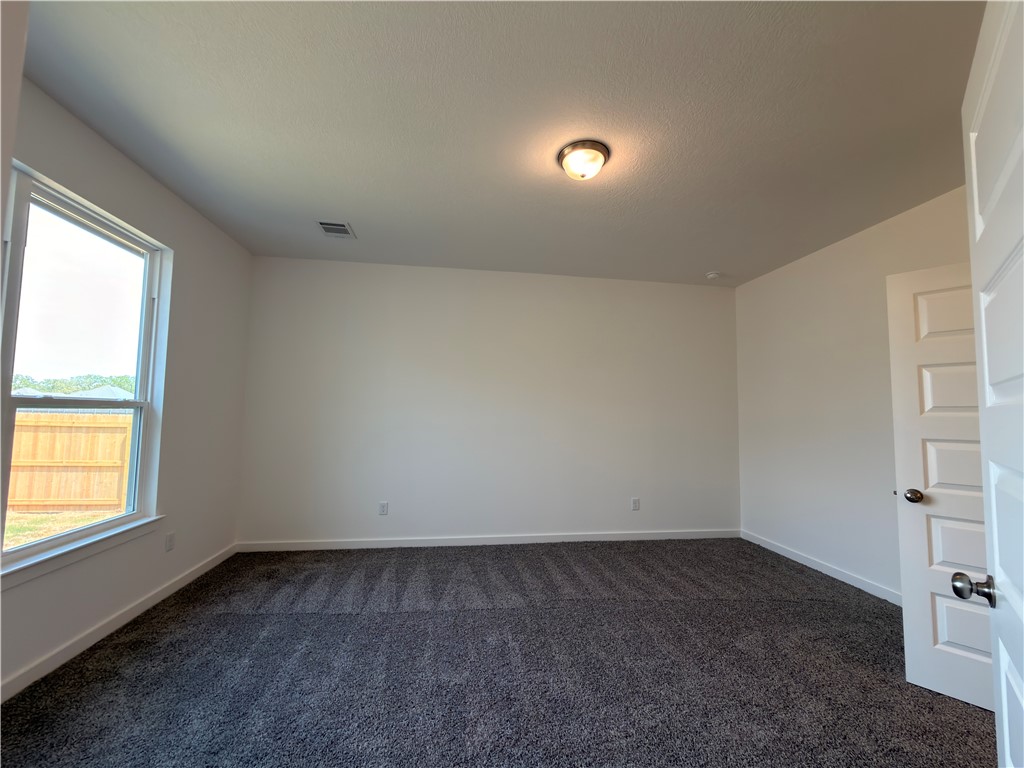6053 Badger Street Bryan, TX 77807 - Photo 10 of 13 an empty room with a window