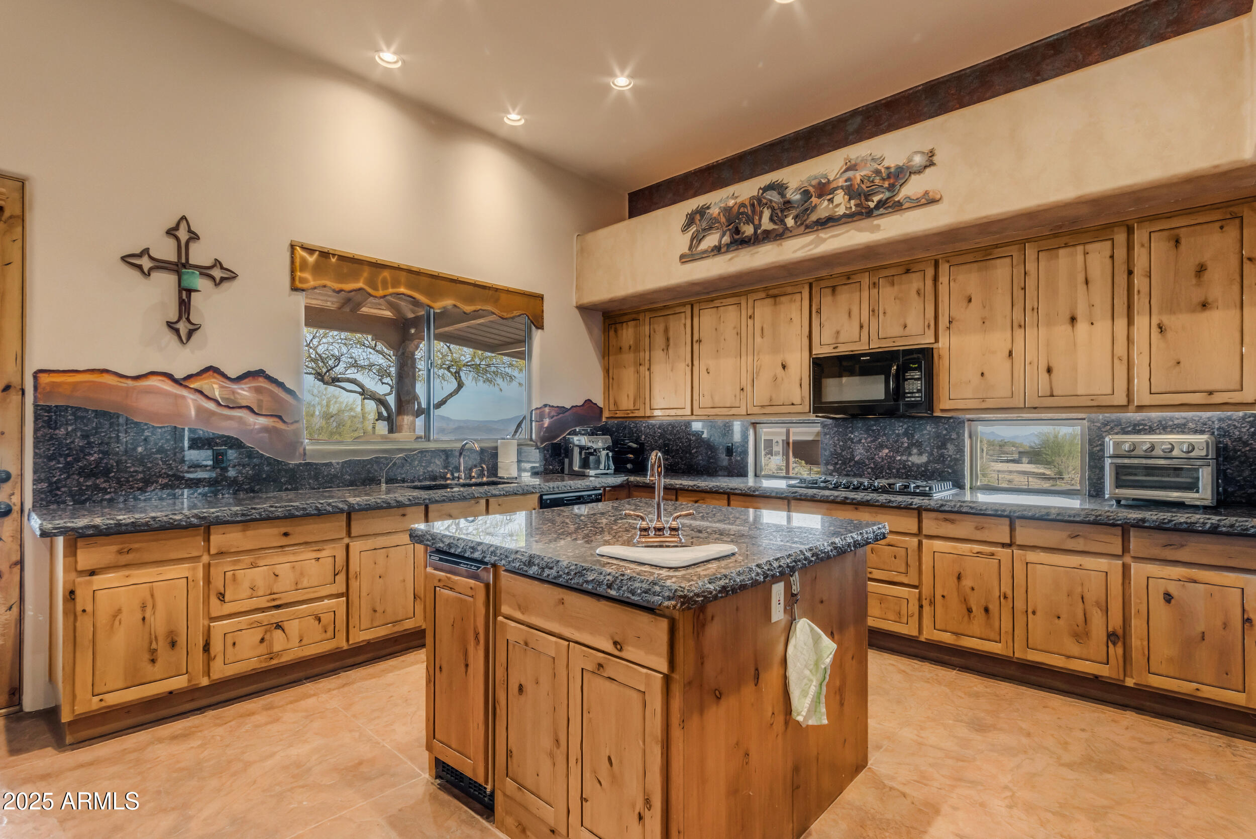 32905 North 140th Street Scottsdale, AZ 85262 - Photo 59 of 149 a kitchen with stainless steel appliances granite countertop a sink stove and cabinets