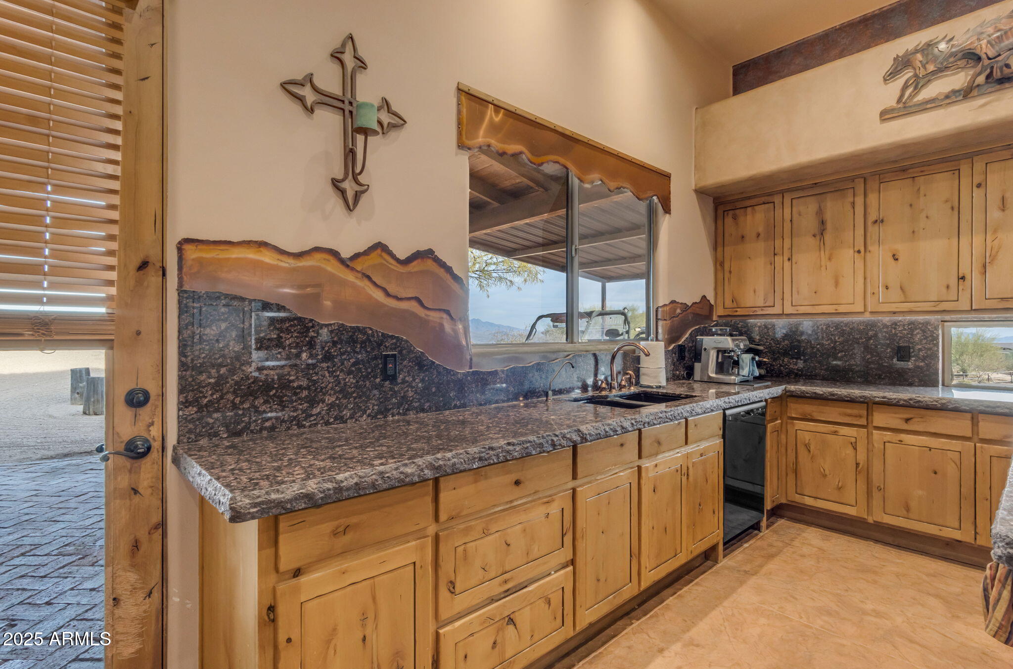 32905 North 140th Street Scottsdale, AZ 85262 - Photo 64 of 149 a kitchen with stainless steel appliances granite countertop a sink and cabinets