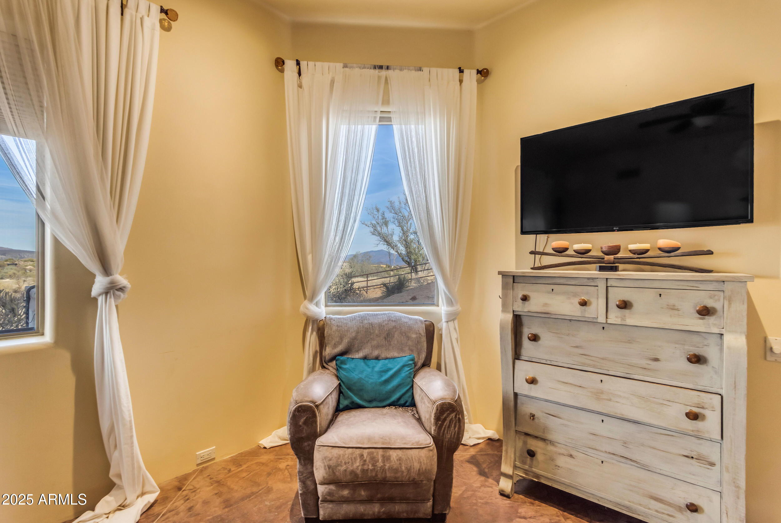 32905 North 140th Street Scottsdale, AZ 85262 - Photo 85 of 149 a living room with furniture and a flat screen tv
