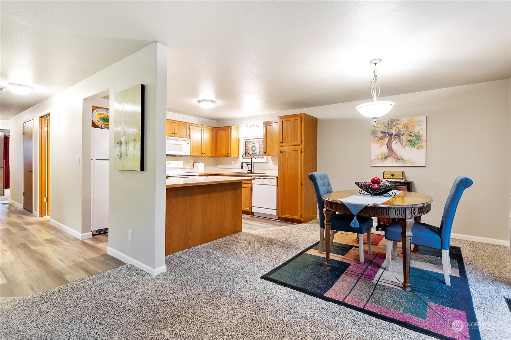 107 Fairside Drive, Unit 25 Lynden, WA 98264 - Photo 12 of 29 a view of a dining room with furniture and wooden floor
