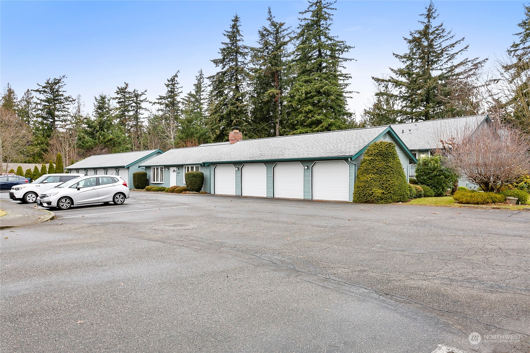 107 Fairside Drive, Unit 25 Lynden, WA 98264 - Photo 2 of 29 a white house with a outdoor space