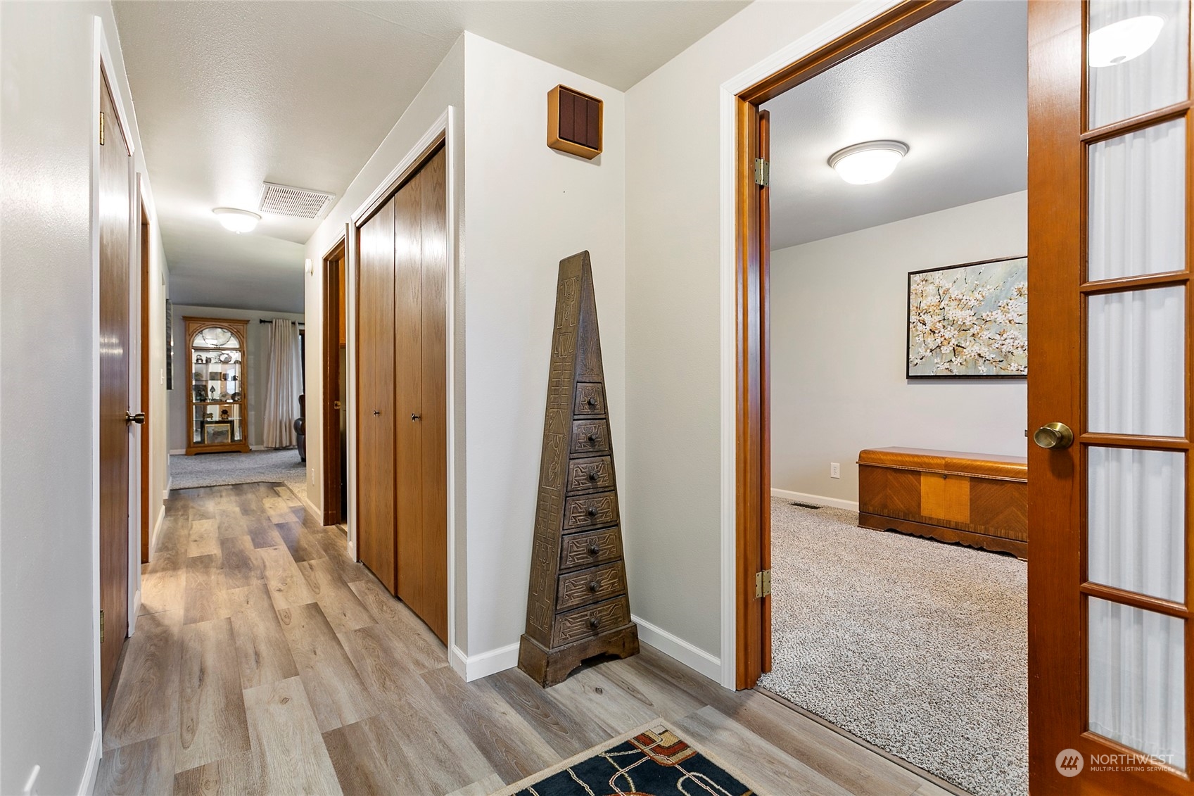107 Fairside Drive, Unit 25 Lynden, WA 98264 - Photo 24 of 29 a view of a hallway with wooden floor and entryway