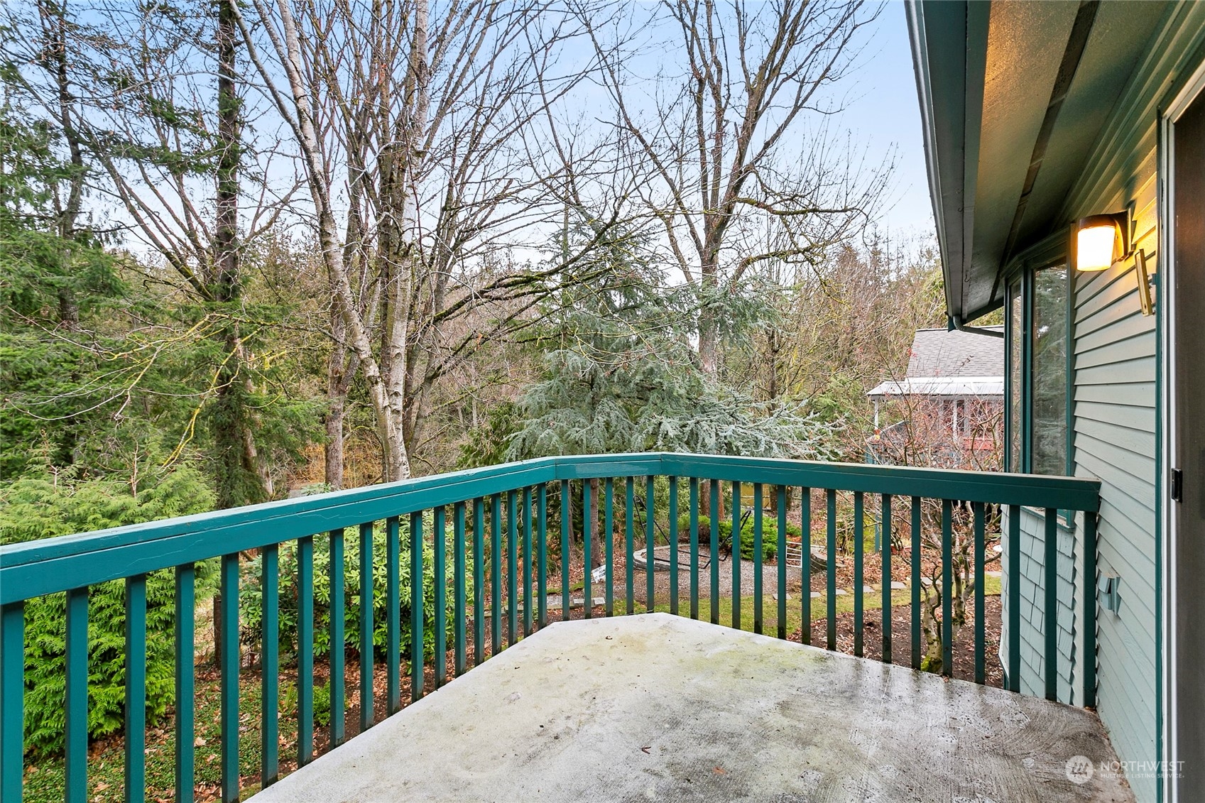 107 Fairside Drive, Unit 25 Lynden, WA 98264 - Photo 26 of 29 a balcony with trees in front of it
