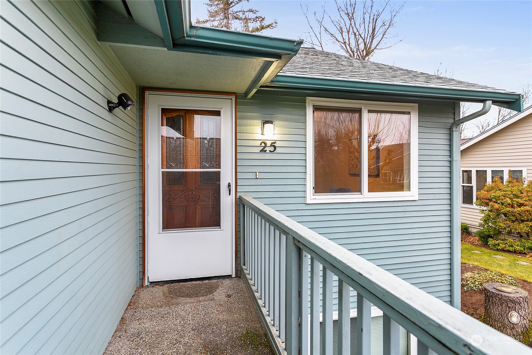 107 Fairside Drive, Unit 25 Lynden, WA 98264 - Photo 28 of 29 a view of a house with wooden fence and two windows