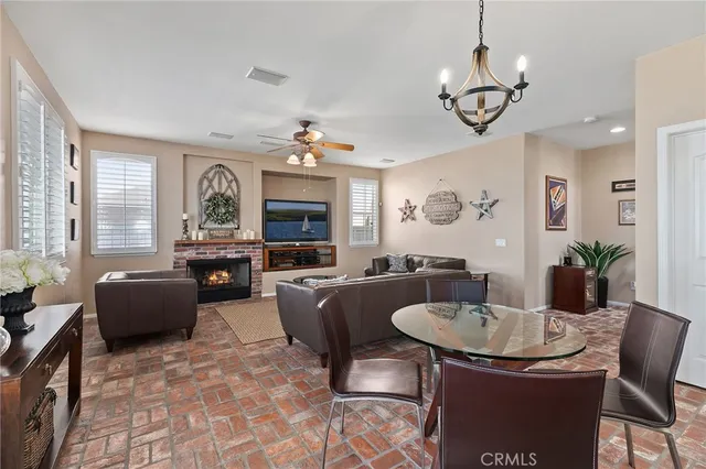 a bedroom with a bed dresser and a window