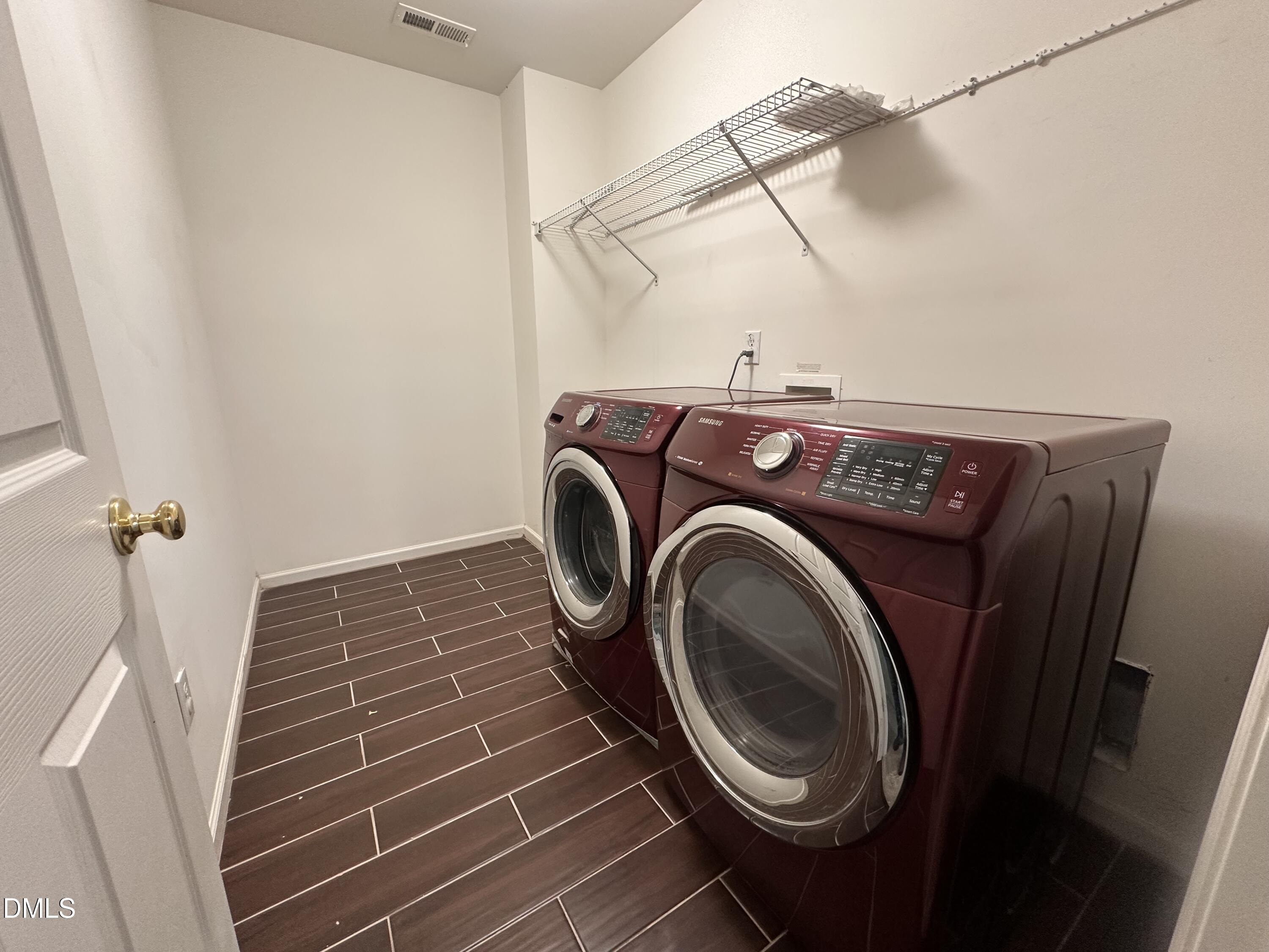 1220 Arbor Greene Drive Garner, NC 27529 - Photo 13 of 17 a utility room with dryer and washer